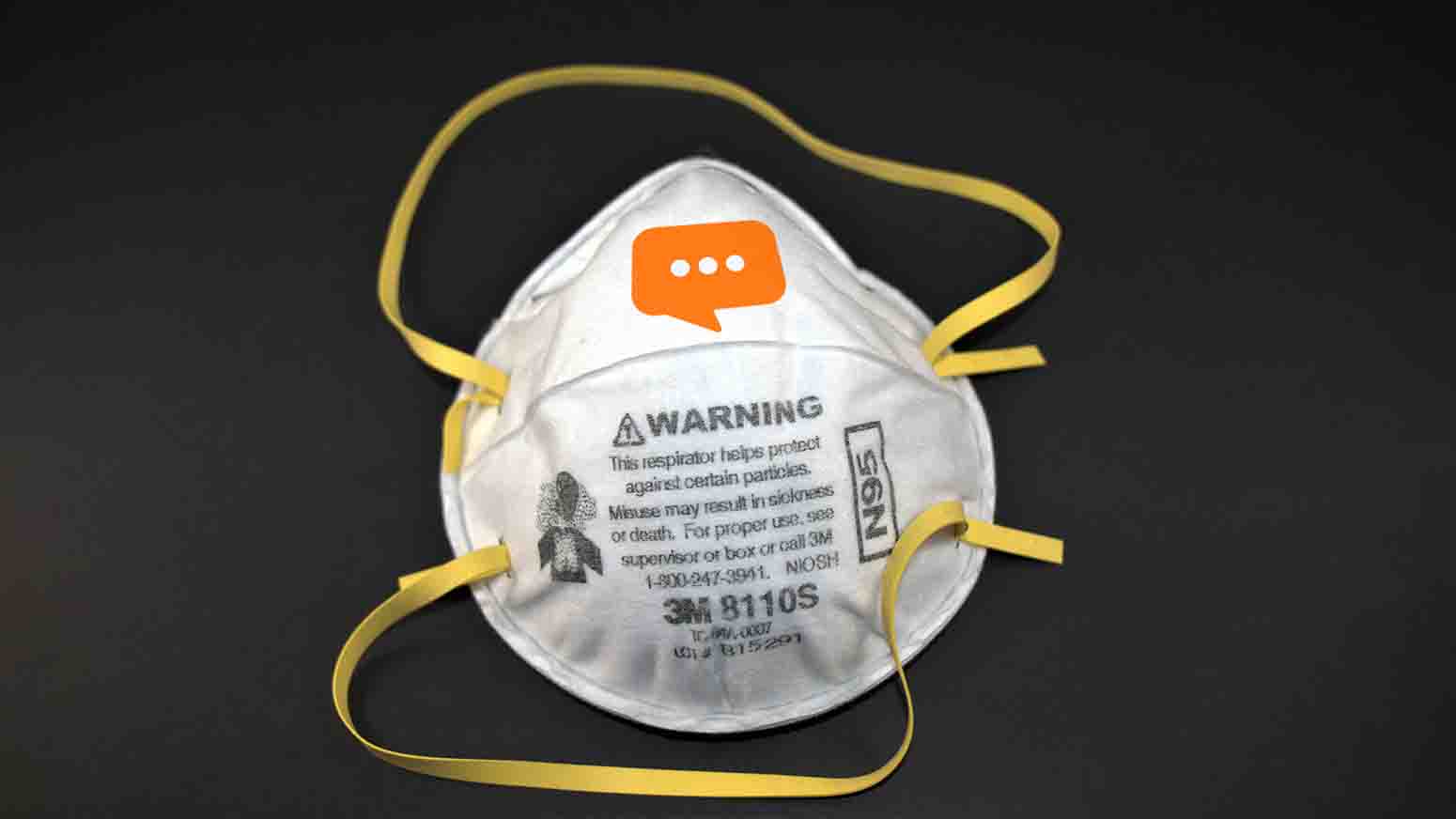 N95 Respirator(face mask) with slings isolated on black backgrou