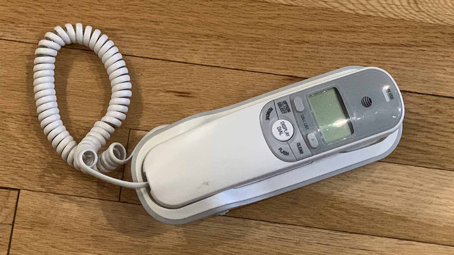 An aged white AT&T TR1909 Trimline Corded Phone